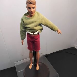 Mattel Ken Doll with Green Sweater and Red Shorts